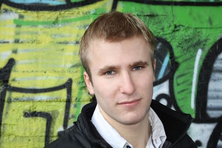 Portrait of the smiling young adult manの写真素材