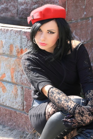 Portrait of the beautiful woman in red hatの写真素材