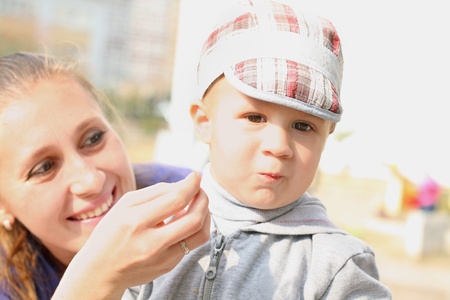 Portrait of little boy with his momの写真素材