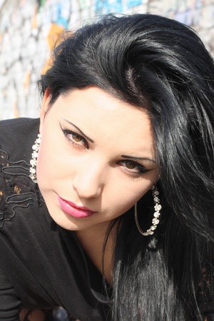 Portrait of the pretty brunette's glareの写真素材