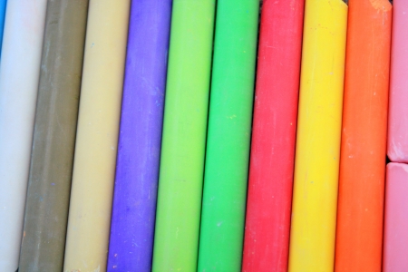 Close up of the coloured chalks for the backgroundの写真素材