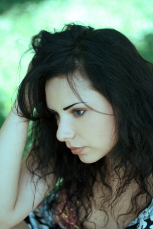 Portrait of the beautiful thoughtful womanの写真素材