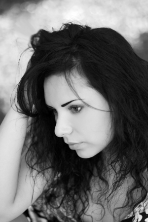 Portrait of the beautiful thoughtful womanの写真素材