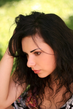 Portrait of the beautiful thoughtful womanの写真素材