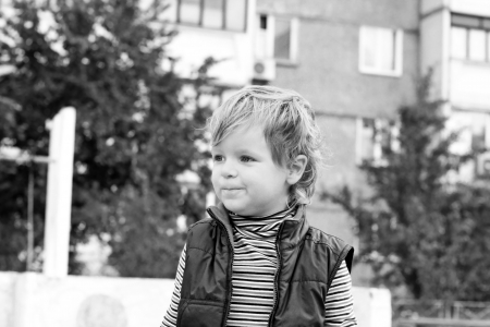 Portrait of the little lovely smiling boyの写真素材