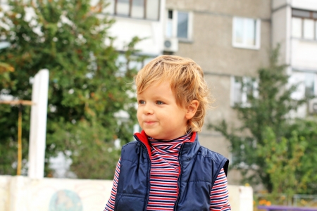 Portrait of the little lovely smiling boyの写真素材