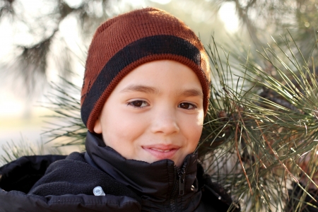 Outdoors portrait of the handsome smiling teenager boyの写真素材