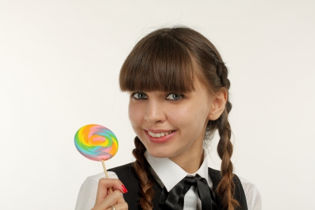 Close up of lovely girl with lollipopの写真素材