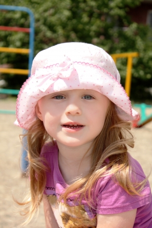 Outdoors portrait of the lovely little girlの写真素材