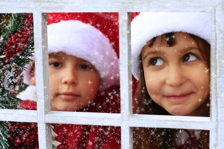 Portrait of two lovely kids. Christmas Fairy tale.の写真素材