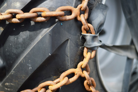 Snow chains on wheelの写真素材