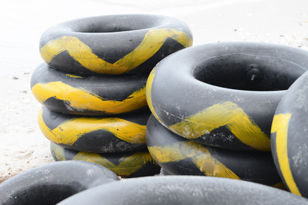 inner-tube for rent on the beach Thailandの写真素材