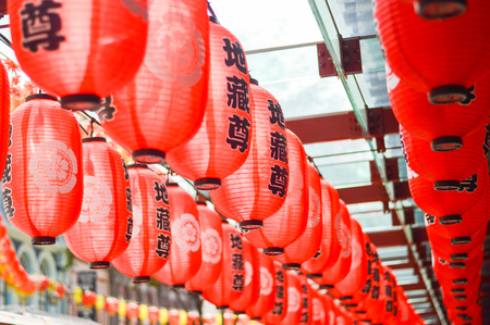 Chinese Lanterns, chinese traditional lanterns hanging across in rows againstの写真素材