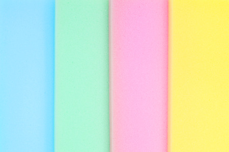 Abtract of colorful sponges isolated on white background.の写真素材
