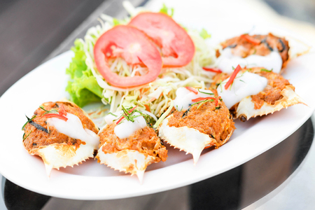Steamed curry crab, Deep-fried crab meat and minced pork in crab shell. Fried Crab Meat (Pu Ja), Thai Food.の写真素材