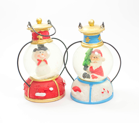 Christmas snow ball or glass globe isolated on white background. Christmas decoration.の写真素材