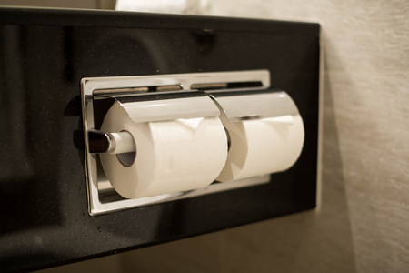 Two toilet paper roll in bathroom.の写真素材