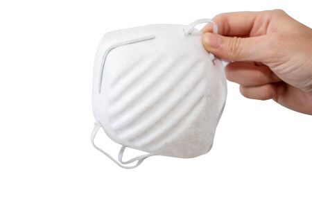 Hand holding Face mask virus outbreak or air pollution concept.の写真素材