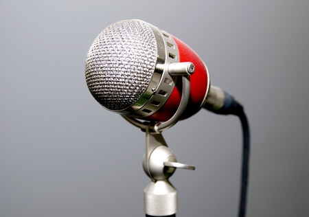 old microphone for singer with a gray backgroundの写真素材