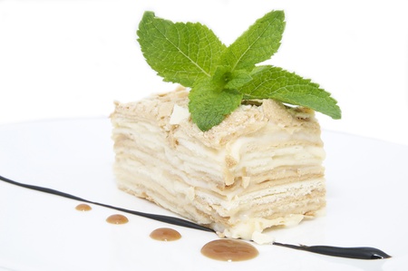 layered dessert on a white background decorate with mint