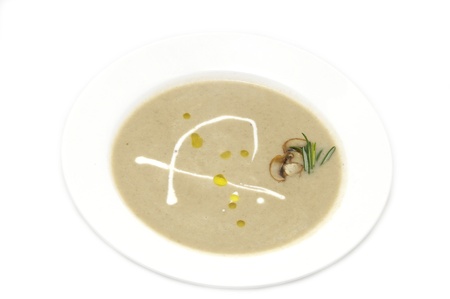 Vegetarian soup of mushrooms on a white backgroundの写真素材