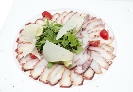 carpaccio of octopus in a restaurant on a white backgroundの写真素材