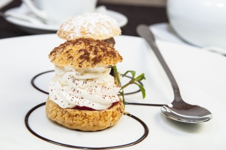 tartlets on a white plate in a restaurantの写真素材
