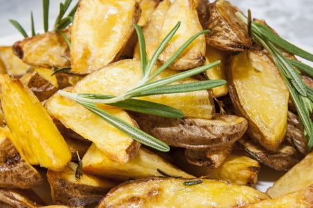 fried potatoes on a plate in a restaurantの写真素材