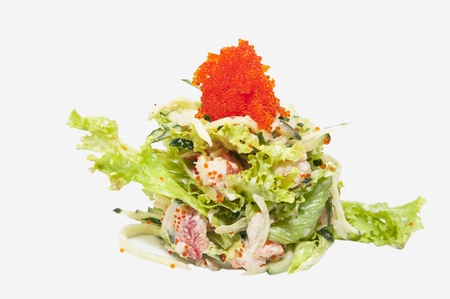 salad greens and seafood on a white backgroundの写真素材