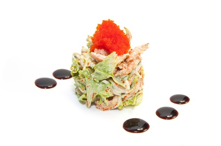 salad greens and seafood on a white backgroundの写真素材