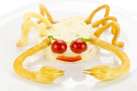 salad with cheese and crab meat in the form of a crabの写真素材