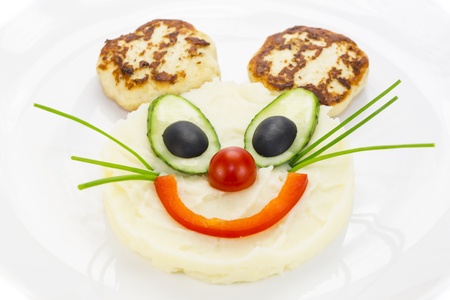 mashed potatoes and cakes in the shape of a mouseの写真素材