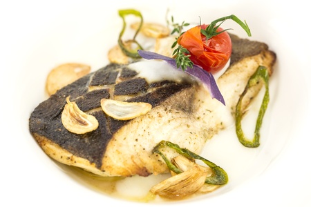 baked fish in cream sauce with lemon