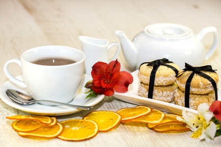 cookies and tea on a table in a restaurant dessertの写真素材