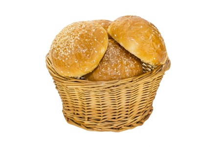 Baking in a wicker bread bins on white backgroundの写真素材