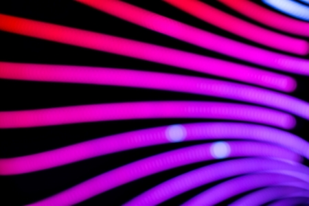 Neon abstract background of lines and bokehの写真素材
