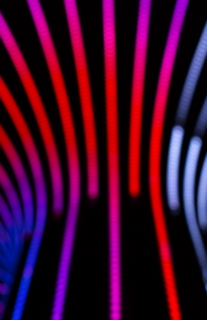 Neon abstract background of lines and bokehの写真素材