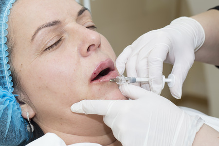 Cosmetic treatment with botox injection in a clinicの写真素材