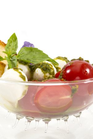 Caprese tomato and cheese on the table in a restaurantの写真素材