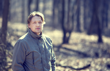Portrait of a young man in the park