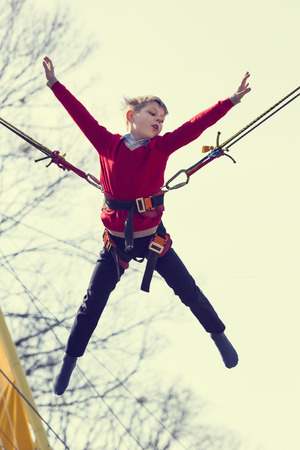 boy on a trampolineの写真素材