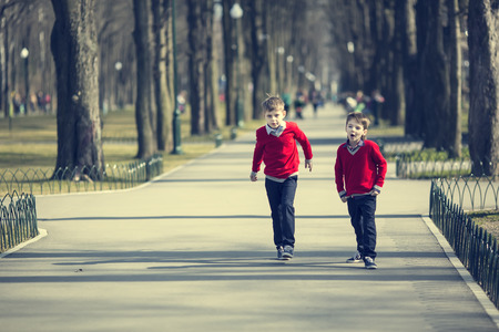 Portrait of a boy on a walk in the parkの写真素材