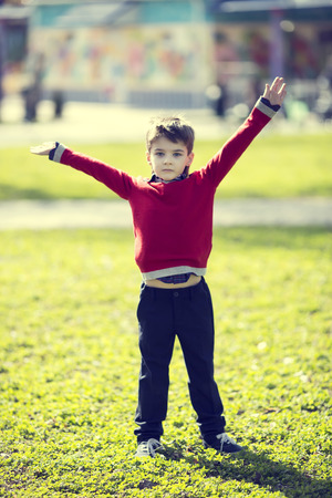 Portrait of a boy on a walk in the parkの写真素材