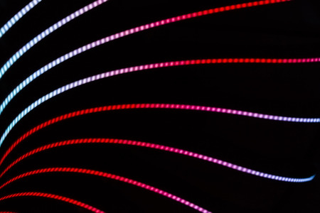 Neon abstract background of lines and bokehの写真素材