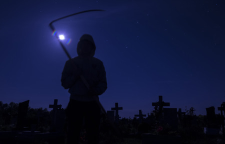 death in the cemetery at night the moonの写真素材