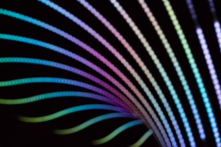 Neon abstract background of lines and bokehの写真素材