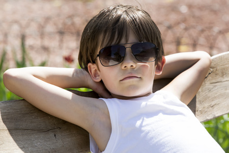 Portrait of a boy on a summer natureの写真素材