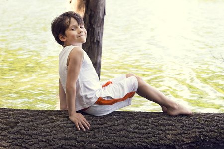 Portrait of a boy on a summer natureの写真素材