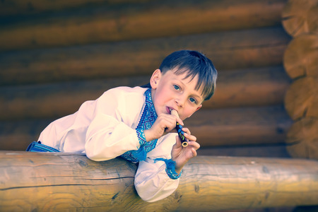 Portrait of a boy on a summer natureの写真素材