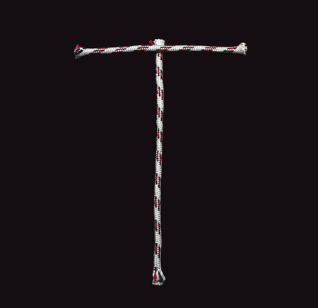 letters of the alphabet of the rope on a black backgroundの写真素材